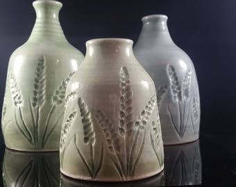 Carved porcelain bottles/vases