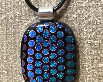 Dichroic glass pendant on black cord