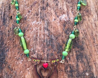 Green leaves and cat necklace