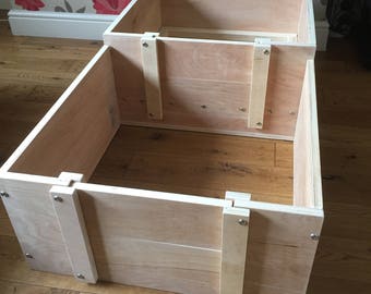 whelping box 24 inch x 24 inch with 12 inch walls and a annex