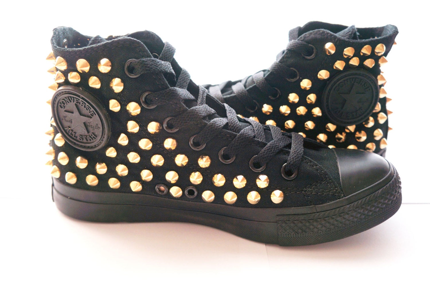 black and gold high top converse