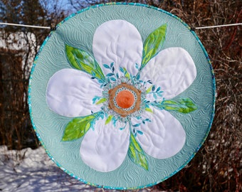 MarveLes Jumbo Apple Blossom Floral Round Quilted Table Topper Home Decor in white satin on Aqua Blue Shimmer fabric