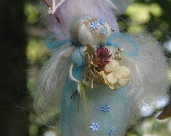 A charming needle felted mobile with angels