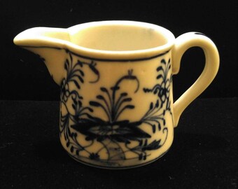 Small blue and white pitcher