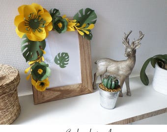 Photo frame decorated with paper flowers