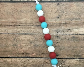 Teething Pacifier Clip - Teal, Red and White