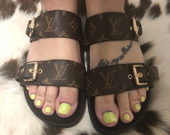 This weekend only... Sale.... Long awaited Louis Vuitton slides