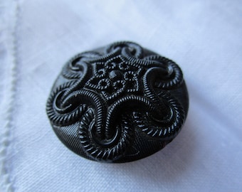 0336 - Medium 1800s Black Glass Button Raised Center Imitation Needlework-Fabric