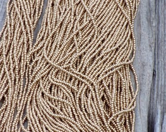 Silk gold seed beads , size 11 gold beads , glass seed beads
