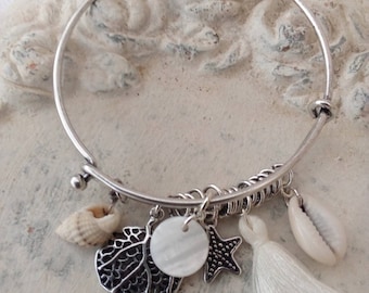 In shades of white charm bracelet