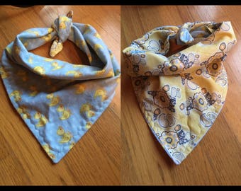 About 25 inch ducks and yellow paisley reversible tie on bandana