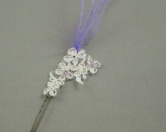 Lace hair picks and purple bead for the bride.