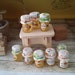 Dollhouse miniature honey jar with real honey inside 1:12 scale - random label