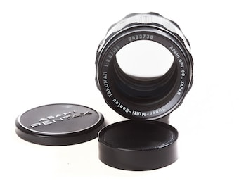 Super-Multi-Coated Asahi Pentax Takumar 135mm F3.5 portrait lens with hood. M42 screw mount.