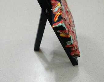 Miniature abstract painting and easel