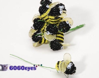Yellow and black chenille bees