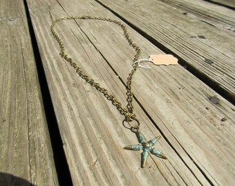 Turquoise and bronze-colored star pendant necklace