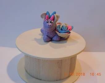 Beautiful pastel sitting clay dragon