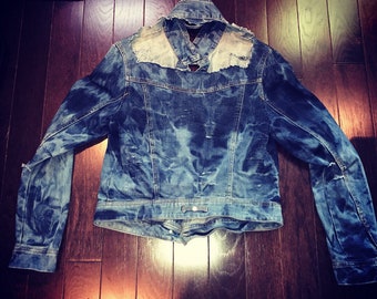 Authentic custom ripped acid washed denim jacket.
