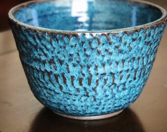 Handmade carved ceramic bowl