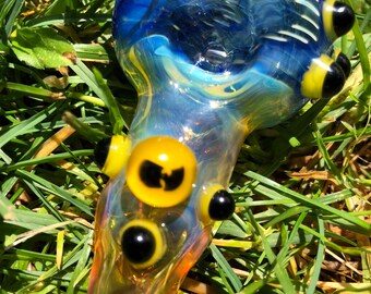 WU Tang Glass spoon. WU TANG millie with yellow and blue highlights. Fumed with silver and gold, color changing. Awesome piece