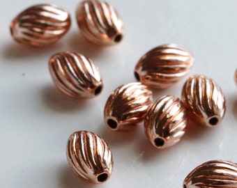 Solid Copper Beads - Oval 3mm x 5mm textured spacer beads - 100 beads