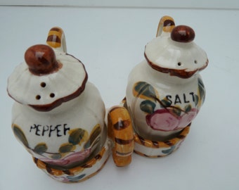 Salt and pepper shakers with tray