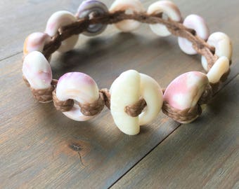 Purple puka shell laced bracelet size 6 3/4