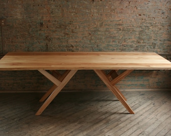 Reclaimed Wood Dining Table, modern, with natural finishes.