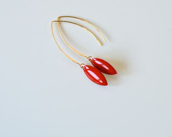 Dangling earrings - red enameled pastilles