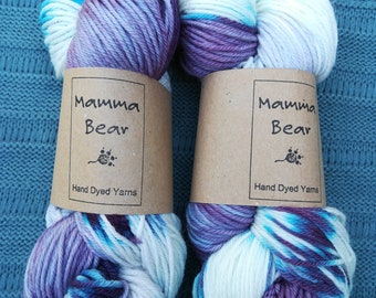 Hand dyed DK yarn, super-wash merino/nylon wool. All the Violets.