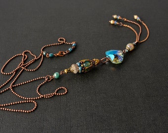 Beadwoven pendant with with crystal heart