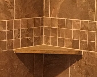 Stone shower corner shelf