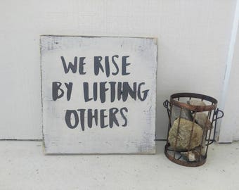 WE RISE by Lifting Others // encouragement // wood sign // rustic decor // distressed // farmhouse decor // inspirational words