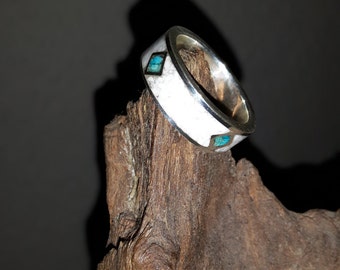 Silver ring inlaid with natural stone