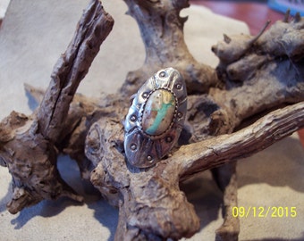 Royston Ribbon Turquoise Sterling Concho ring.