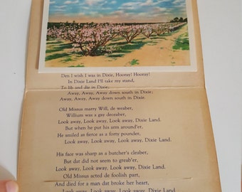Greetings from Dixieland view folder postcard