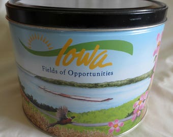 Vintage "Iowa Fields Of Oppertunities" Popcorn Tin 10" Diameter x 7.5" Tall Featuring State Flag, Capitol, Flower, and Pella Windmill