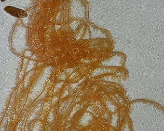 Embroidery style orange chenille thread