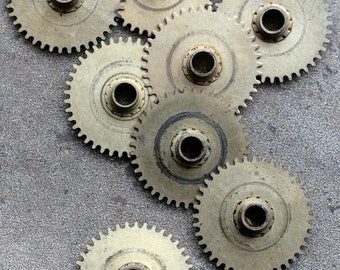 Vintage clock brass gears -- set of 8 -- D12