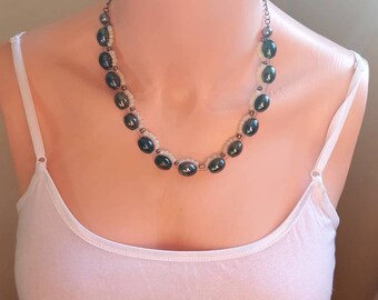 Woven glass emeralds