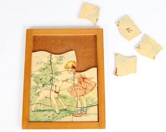 Vintage Jigsaw Puzzle-Wooden puzzle with girl and lamb in spring