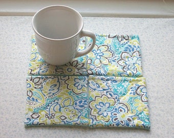 blue yellow and green flowers hand quilted set of mug rugs coasters