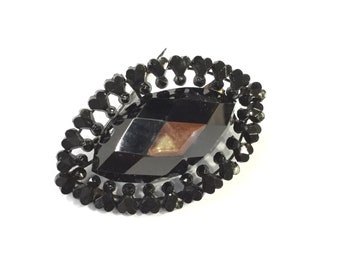 Victorian french jet brooch with foil glass top