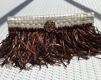 Chick and elegant clutch made 100% recycled