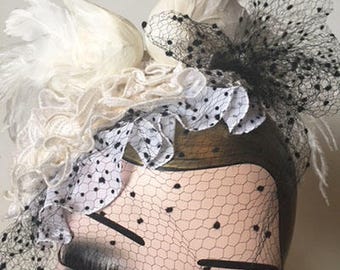 Headpiece with two loving swans, lots of lace ruffles and delicate vintage veiling