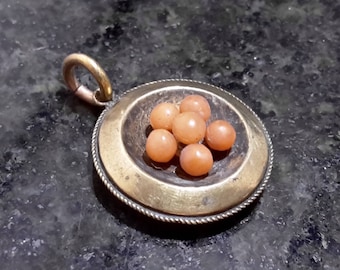 This is a stunning quality antique victorian 15ct yellow gold coral locket pendent