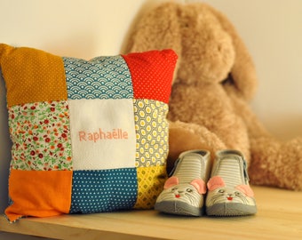 Embroidered cushion