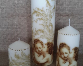 Set of three unscented decoupage candles.