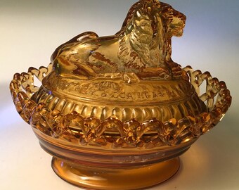 Gorgeous Imperial Glass “Lion-on-Nest” amber glass covered dish